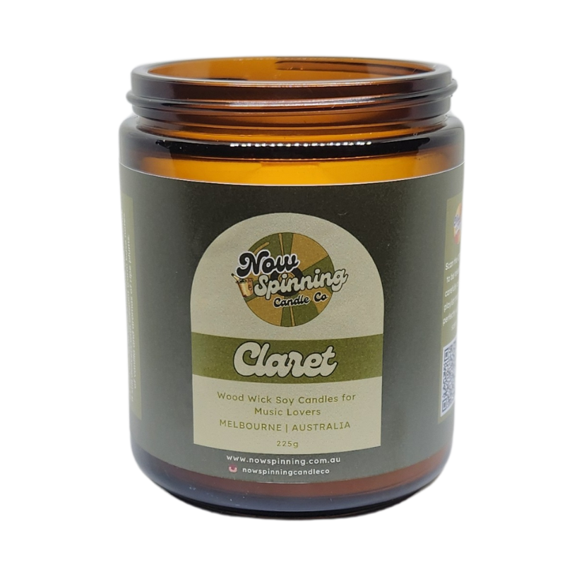 A brown amber glass jar with a black screw top lid, labeled as 'Claret' with a green and yellow brand logo.