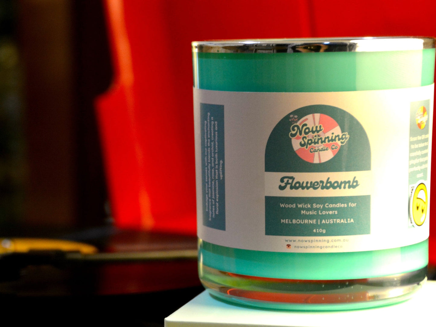 Candle with a label on a blurred background