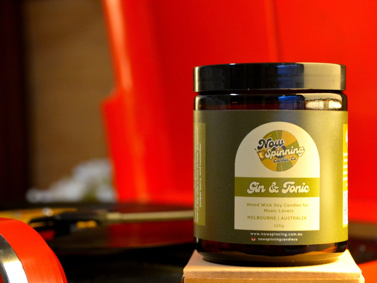 Jar of 'Now Spinning' Gin & Tonic candle with a red record player