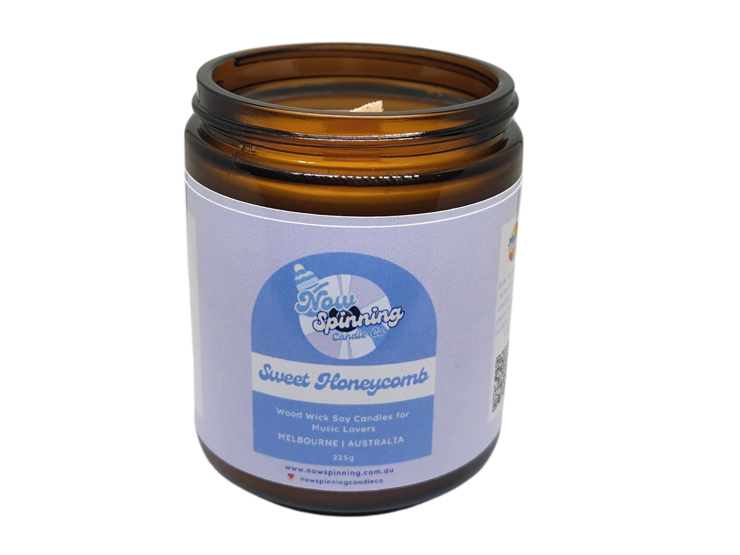 Sweet Honeycomb Candle in an amber jar with a label on a white background