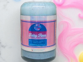  'Fairy Floss' candle with a pink background