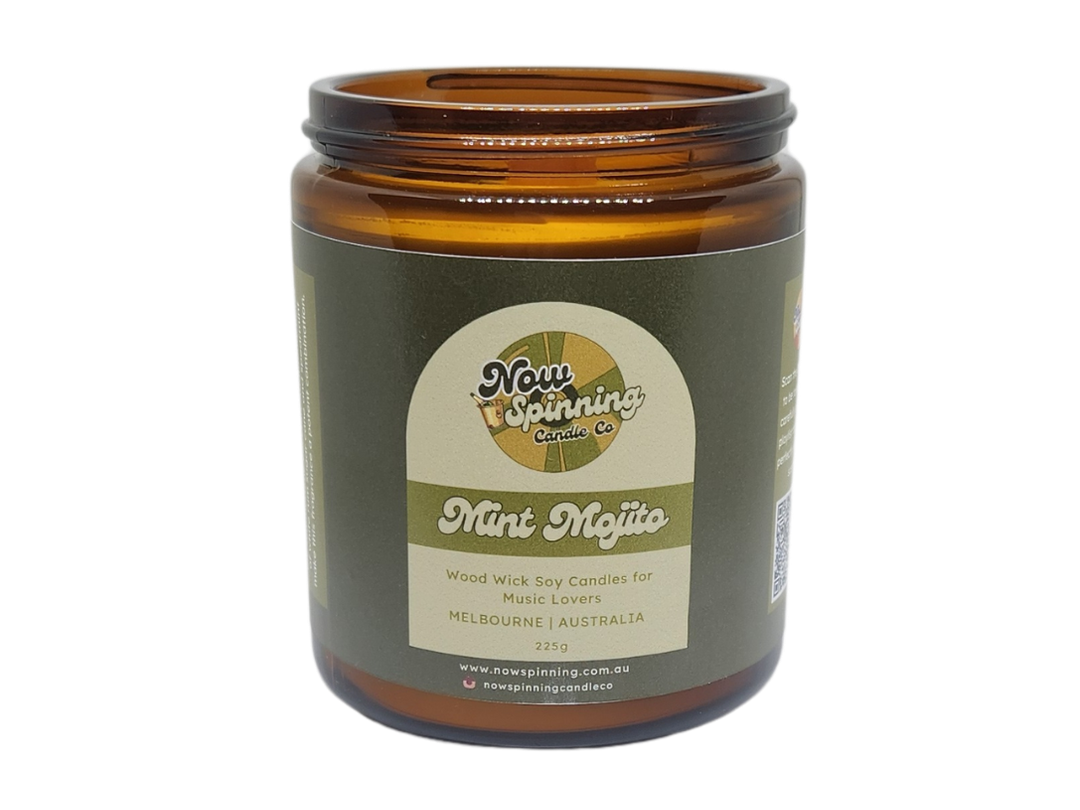 A brown amber glass jar with a black screw top lid labeled 'Mint Mojito'.