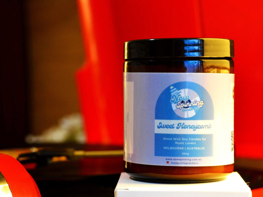 Sweet Honeycomb candle with a red record player