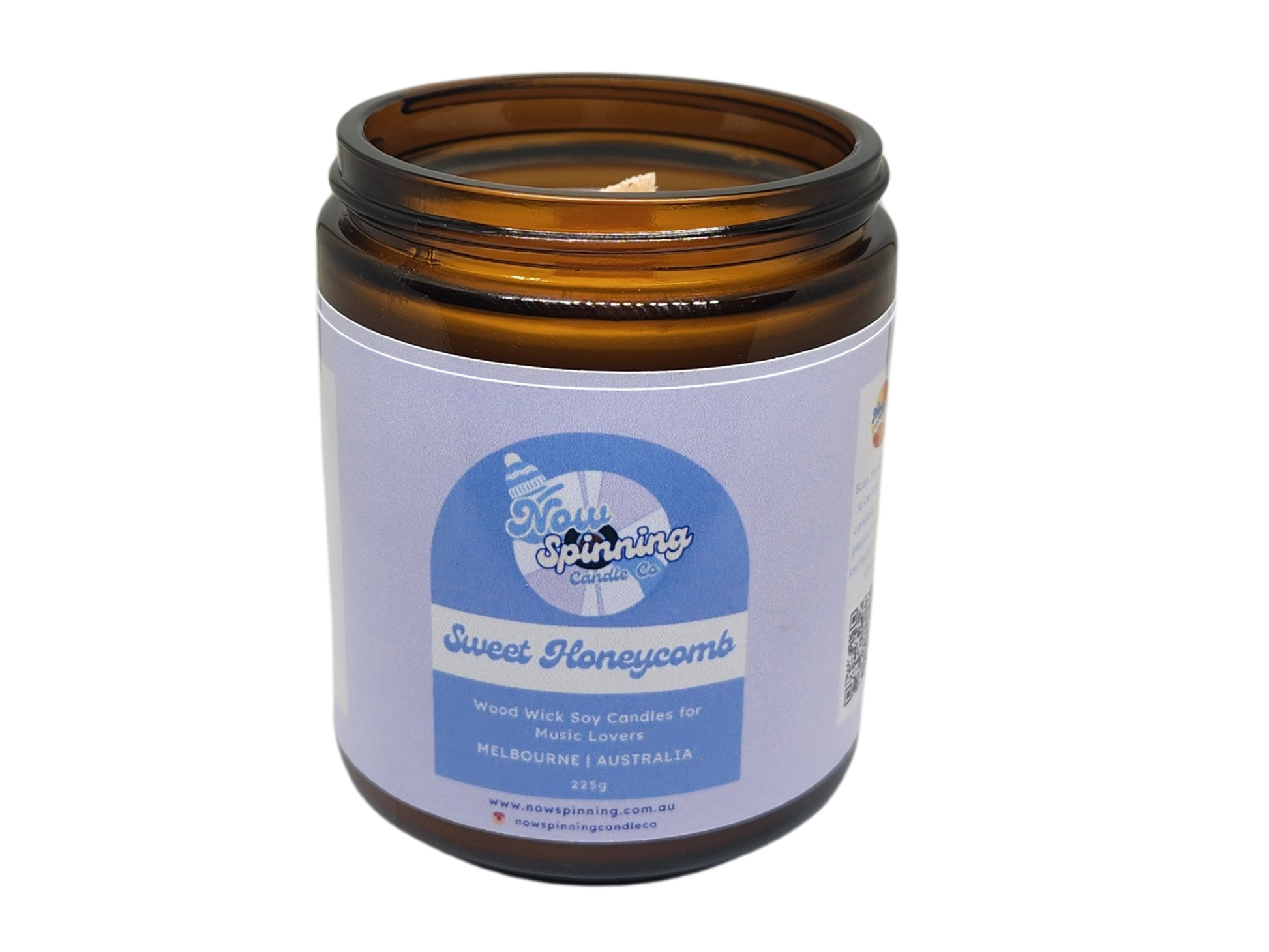 Sweet Honeycomb Candle in an amber jar with a label on a white background