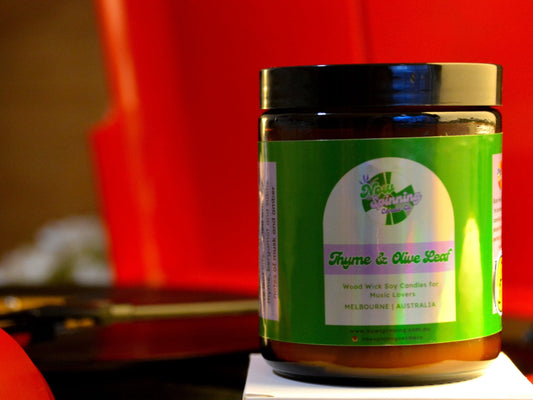 Jar with a green label with a red record player